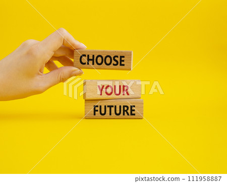 Choose your future symbol. Wooden blocks with words Choose your future. Beautiful yellow background. Businessman hand. Business and Choose your future concept. Copy space. 111958887
