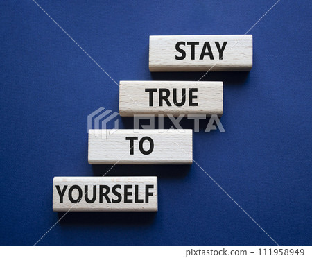 Stay True to Yourself symbol. Wooden blocks with words Stay True to Yourself. Beautiful deep blue background. Business and Stay True to Yourself concept. Copy space. Stay True to Yourself symbol. Wooden blocks with words Stay True to Yourself. Beautiful deep blue background. Business and Stay True to Yourself concept. Copy space. 111958949