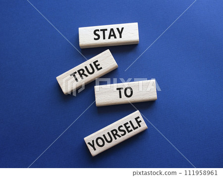 Stay True to Yourself symbol. Wooden blocks with words Stay True to Yourself. Beautiful deep blue background. Business and Stay True to Yourself concept. Copy space. 111958961
