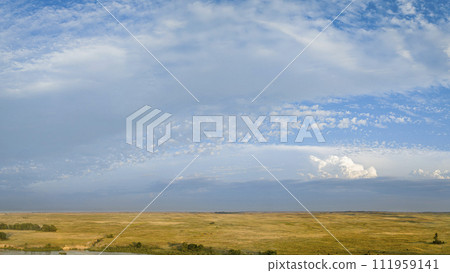 clouds over Nebraska Sandhills and Dismal River, late summer aerial view 111959141