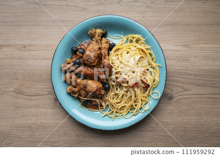 Cacciatore hunter's stew with spaghetti noodles Cacciatore hunter's stew with spaghetti noodles 111959292