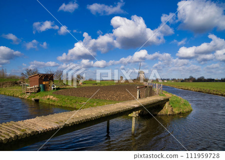 Bridge to an allotment garden Bridge to an allotment garden 111959728