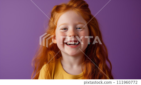 Red haired girl portrait, girl in yellow t-shirt with redhead hair happy smiling with white teeth on solid neutral violet background Red haired girl portrait, girl in yellow t-shirt with redhead hair happy smiling with white teeth on solid neutral violet background 111960772