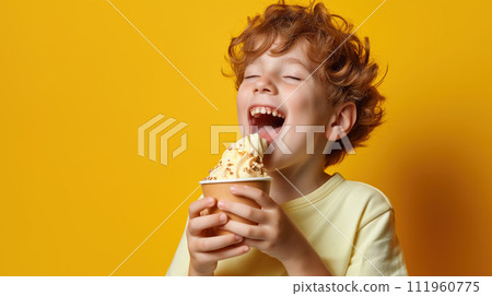 A child happy portrait, boy in yellow t-shirt eating ice cream in cup, smiling and happy, isolated on yellow background A child happy portrait, boy in yellow t-shirt eating ice cream in cup, smiling and happy, isolated on yellow background 111960775