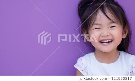 Asian child portrait, girl in white with dark hair happy smiling on solid neutral violet bacnground Asian child portrait, girl in white with dark hair happy smiling on solid neutral violet bacnground 111960817