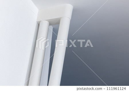 Abstract empty white minimal interior details, niche cornere with tubes 111961124