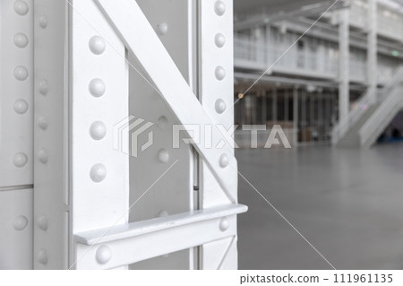 White steel truss pillar structure, close up photo, vintage industrial architecture White steel truss pillar structure, close up photo, vintage industrial architecture 111961135