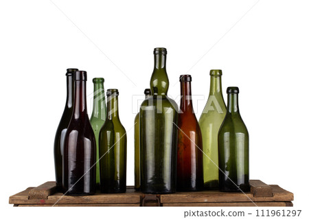 Antique retro green glass bottles on wooden box 111961297