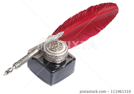 Antique red fountain pen with inkwell on white background 111961310