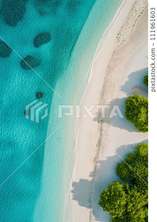 Beautiful tropical island paradise beach with green trees, soft white sand and turquoise water 111961603