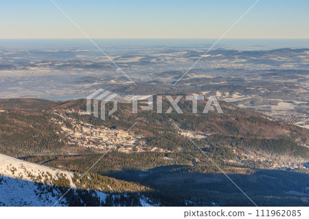 Winter morning , Karpacz view from Snezka , krkonose mountains. Snezka is mountain on the border between Czech Republic and Poland. 111962085
