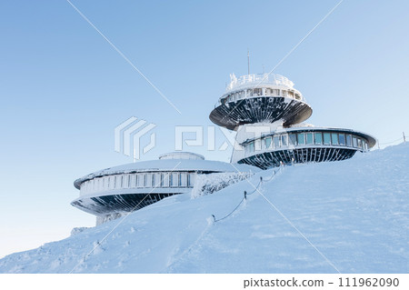 Winter morning, disc shaped meteorological observatory in snezka, mountain on the border between Czech Republic and Poland. 111962090