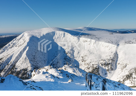 Danger path from Snezka to Silesian house, Giant Mine, Studnicni mountain , view from  snezka, mountain on the border between Czech Republic and Poland, winter morning 111962096