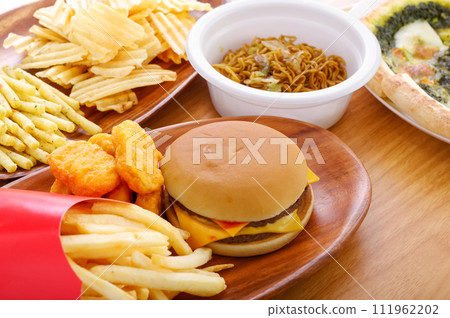 lots of unhealthy junk food 111962202
