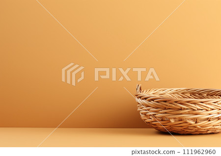 Wicker Basket on side with wall and floor 111962960