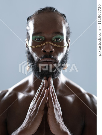 Bearded black gay man with makeup joining hands in Bearded black gay man with makeup joining hands in 111963720