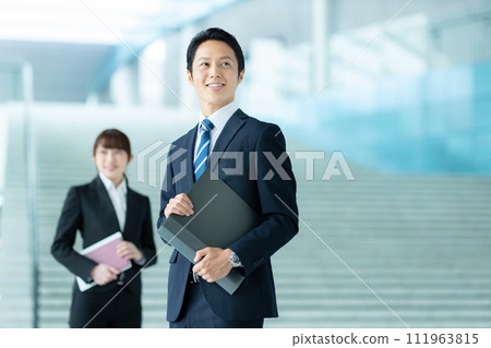 Business image of men and women side by side Business image of men and women side by side 111963815