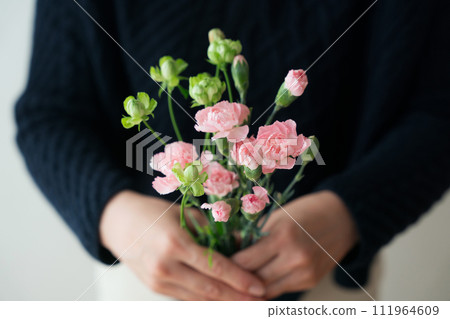 A woman with a bouquet 111964609
