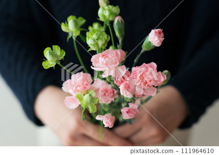 A woman with a bouquet A woman with a bouquet 111964610