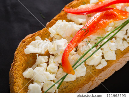 Toast with soft cheese and bell pepper Toast with soft cheese and bell pepper 111968393