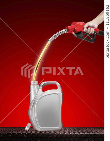 Hand holding plastic gallon refill dispenser placed on metal background isolated on red background 111969162