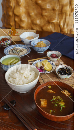 Japanese food image | Rice, miso soup (red soup stock), side dishes, green tea Japanese food image | Rice, miso soup (red soup stock), side dishes, green tea 111970790
