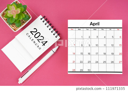 White calendar for April 2024 and pen on pink color background. 111971335