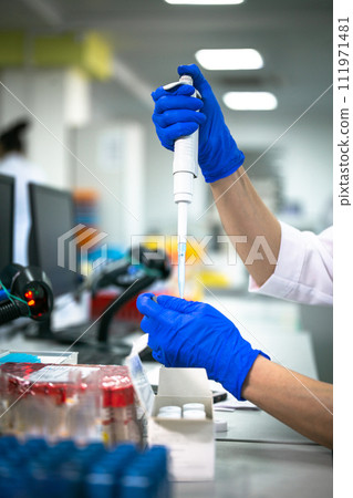 process of working with analyses in the laboratory. hands close-up 111971481