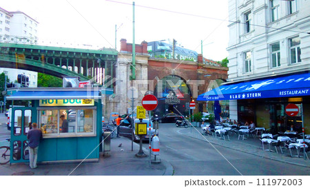 Vienna cityscape with overpass and small food stalls 111972003