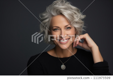 Portrait of a beautiful middle-aged woman with short white hair Portrait of a beautiful middle-aged woman with short white hair 111973509