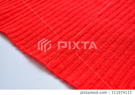 red wool knitted yarn texture, woolen fabric on white background red wool knitted yarn texture, woolen fabric on white background 111974115