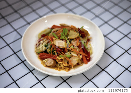 Mix seafood and sausage spicy salad , Thai style cuisine. Mix seafood and sausage spicy salad , Thai style cuisine. 111974175