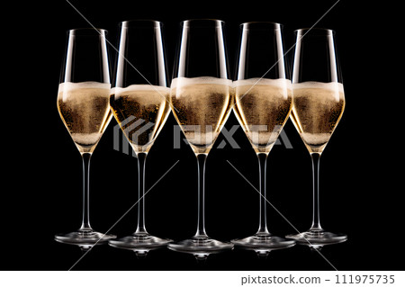 Set of crystal-clear flute glass of champagne isolated on black background Set of crystal-clear flute glass of champagne isolated on black background 111975735