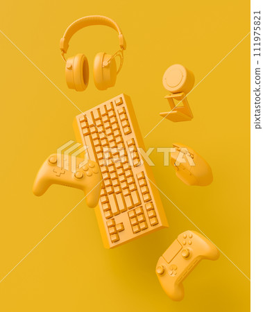 Modern home office setup featuring keyboard, gaming controllers and headphones Modern home office setup featuring keyboard, gaming controllers and headphones 111975821