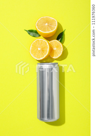 A metal can with fresh lemon halves A metal can with fresh lemon halves 111976360