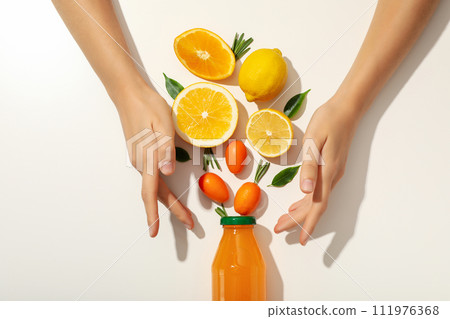 A glass bottle with black slices of lemons A glass bottle with black slices of lemons 111976368