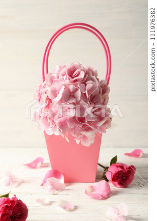 Beautiful, pink flowers on a white background. 111976382