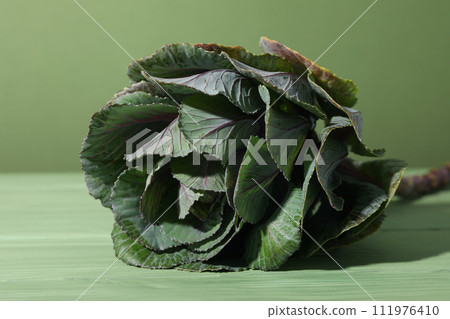 Fresh, beautiful flowers on a green background. Fresh, beautiful flowers on a green background. 111976410