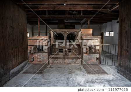 Dachau, Germany - Oven in the crematorium at the Dachau concentration camp for burning dead 111977026