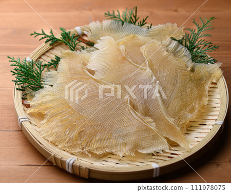 Delicacy Stingray fin (wood grain background) Delicacy Stingray fin (wood grain background) 111978075