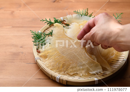 Delicacy Stingray fin (wood grain background) 111978077