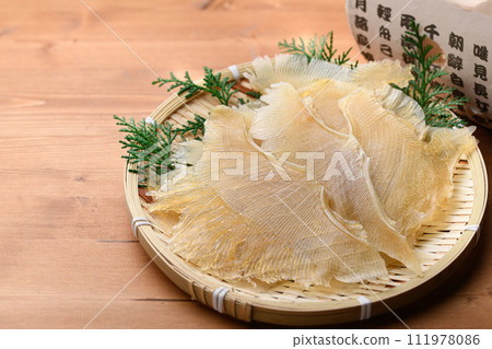 Delicacy Stingray fin (wood grain background) Delicacy Stingray fin (wood grain background) 111978086