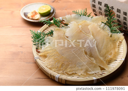 Delicacy Stingray fin (wood grain background) Delicacy Stingray fin (wood grain background) 111978091