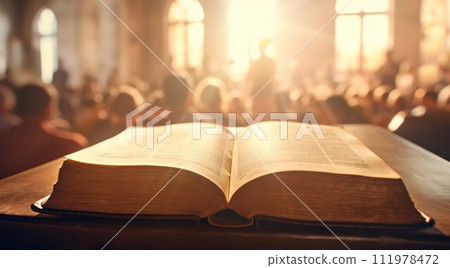 an open bible rests on a table at a church 111978472