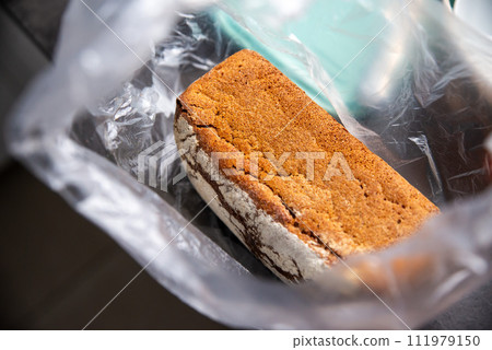 rye bread, sourdough, in a bag, straight from the bakery rye bread, sourdough, in a bag, straight from the bakery 111979150