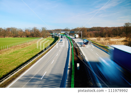 Traffic on motorway with motion blurred cars 111979992