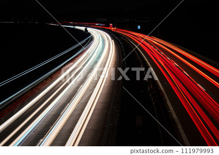 Light trails on the highway at night 111979993