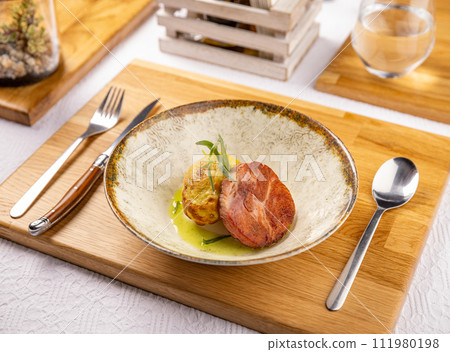 Baked potato with smoked grilled pork ham Baked potato with smoked grilled pork ham 111980198