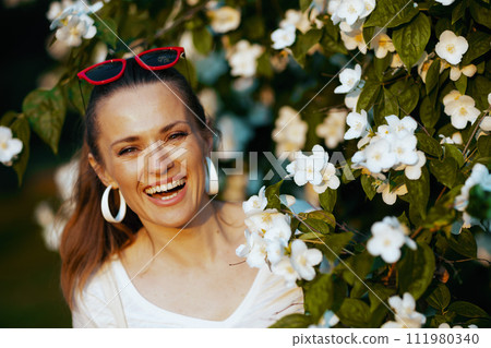 Portrait of happy elegant female in white shirt Portrait of happy elegant female in white shirt 111980340