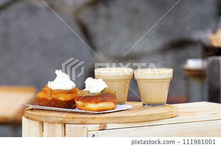 Sweet snack stand at farmers market in Prague 111981001